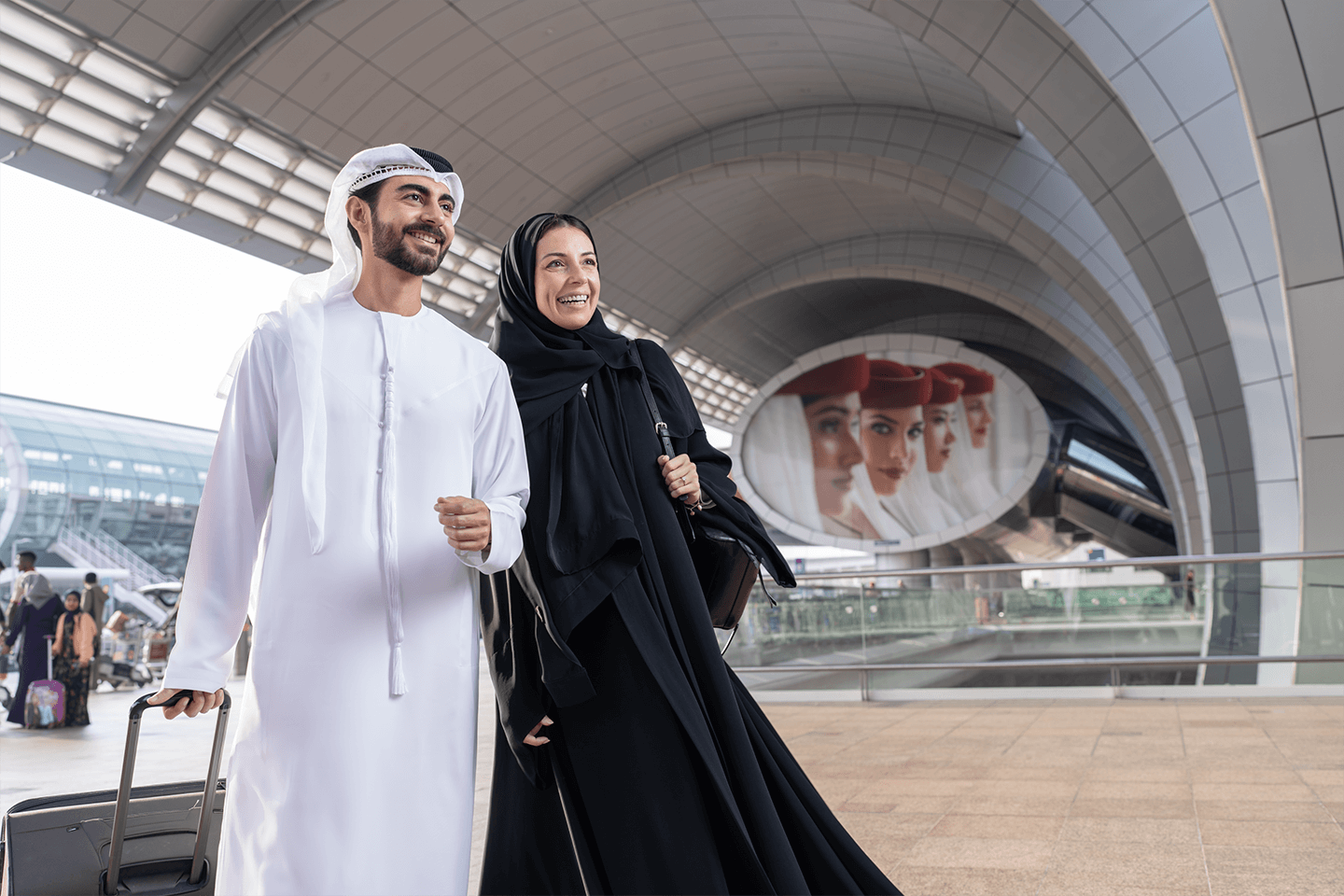 Couple heading towards DXB airport